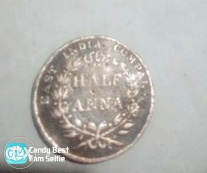 Round Silver-colored Half Indian Anna Coin