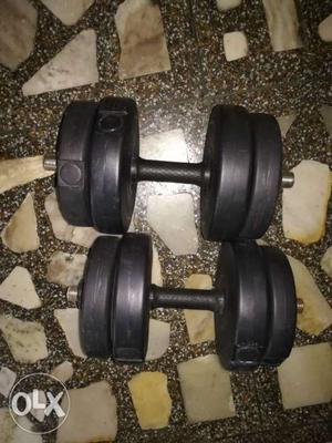 Two Black Adjustable Weight Dumbbells