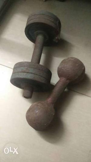 Two Black And Brown Metal Dumbbells