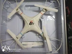 White MJ-Sky Drone quadcopter with camera controlled by