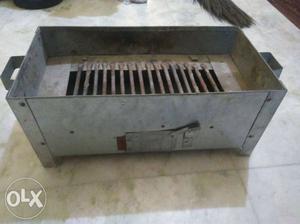2 Time Used Charcoal Grill with four grill stick