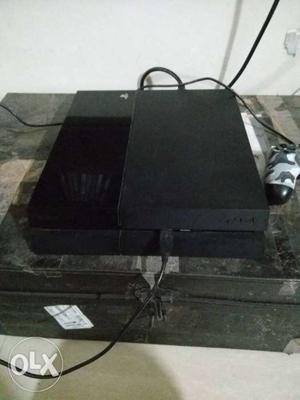 500GB PS4 with one controller for sale. Price