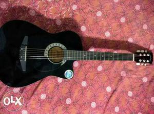 9-10months guitar with all equipments - strings,