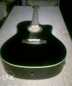 Black And White Wooden Acoustic Guitar