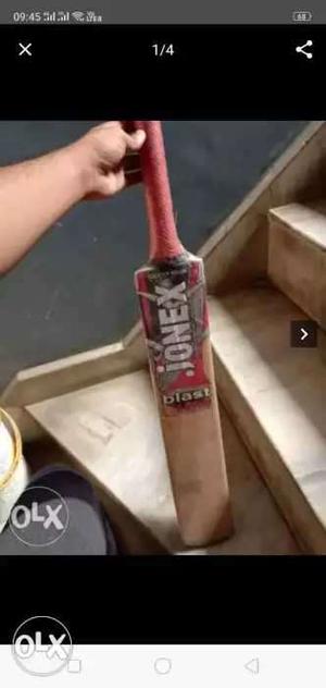 Brown And Red Wooden Cricket Bat Screenshot