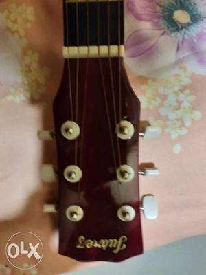 Guitar in unused condition with 1 extra string