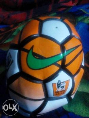 Orange, White, And Green Nike Soccer Ball