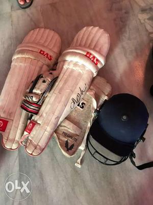 Pair Of White BAS Cricket Batting Pads, Blue Helmet, And