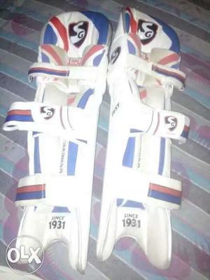 Pair Of White-blue-and-red Shin Guards