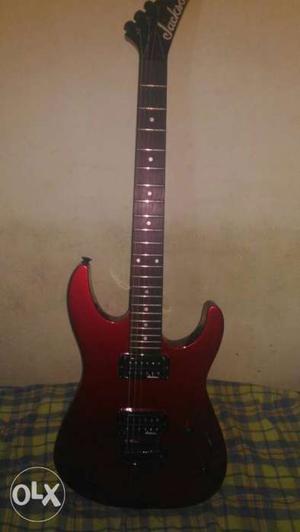 Red And Brown Jackson Stratocaster Guitar