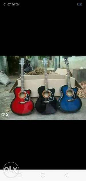 Red, Black, And Blue Cutaway Acoustic Guitars Screenshot