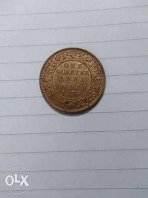 Round Gold-colored One Indian Quarter Anna Coin
