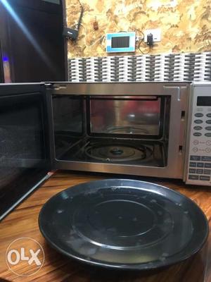 Stainless Steel And Black Microwave Oven