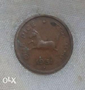 Tambe ka 1 paisa coin with one star on it.