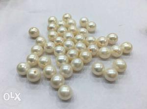 This is fresh water natural round pearl size is 7