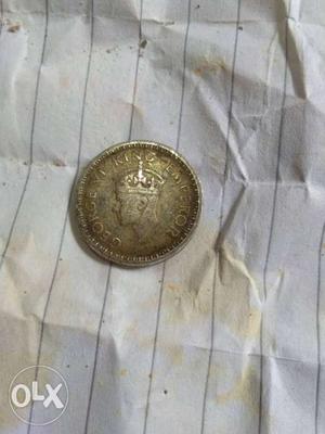 Year  coin 1/4 Rs. 74 year,s old
