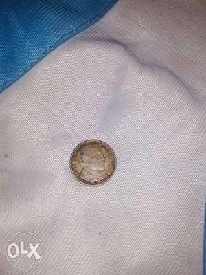  round copper colored coin...
