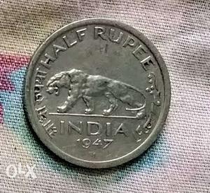 Antique old Indian half rupee Coin.