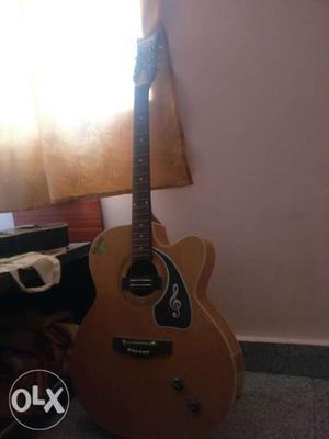 Brown Acoustic Guitar