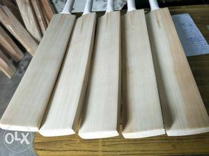 Five Brown Wooden Cricket Bats