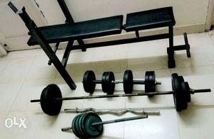 Gym items - bench press, weights, straight and curl bars,