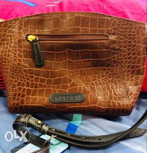 HIDesign leather Sling bag. Brand new with tag.