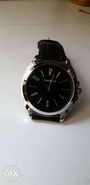Laurels black strap watch..