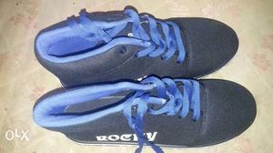 Pair Of Blue-and-black Low Top Sneakers