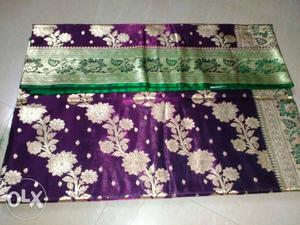 Purple, White, And Green Floral Textile