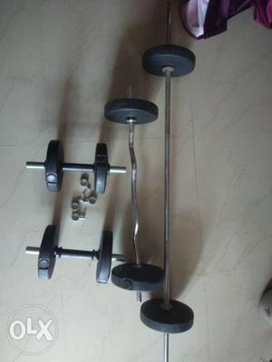 Two Gray-and-black Barbells And Dumbbells