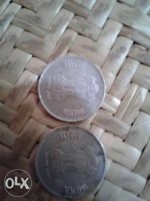 Two Round Silver-colored Indian Coin