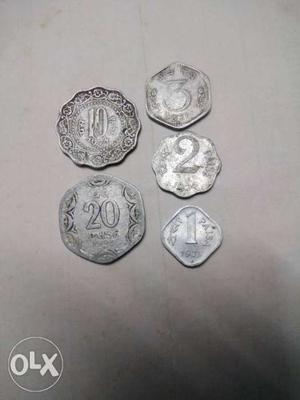 5 silver colored coins
