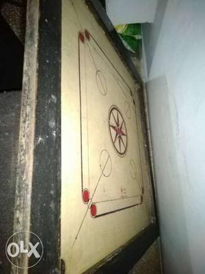 A little damages carrom board