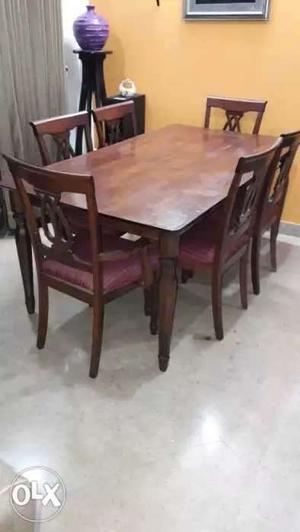 Almost new all wood six chair dining table set