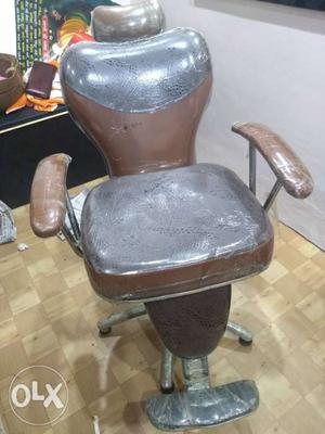 Black And Brown Leather Rolling Armchair