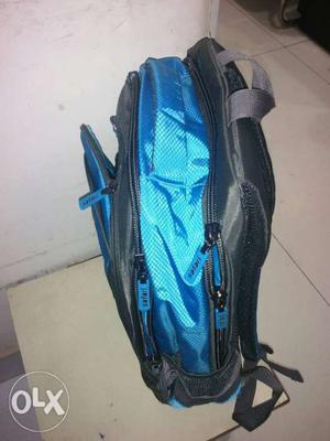 Blue And Black Nylon Backpack