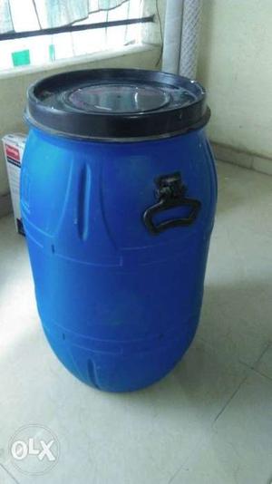 Blue And Black Plastic Water Barrel