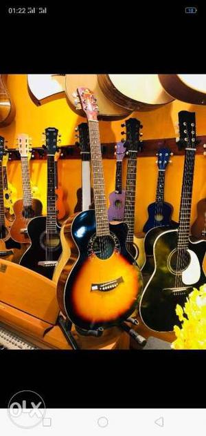 Brown And Black Acoustic Guitar Lot Screenshot