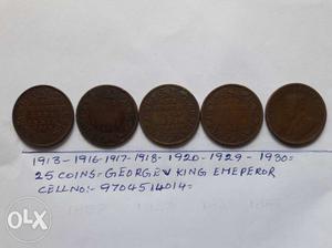 Five Round Copper-colored Coins