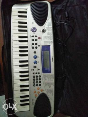Keyboard, Casio MA-150 with a song bank of 49.