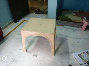 Made of Fiber Plastic, small sized table.