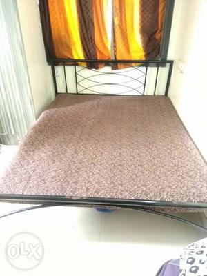 Metal double bed with soft mattresses heavy