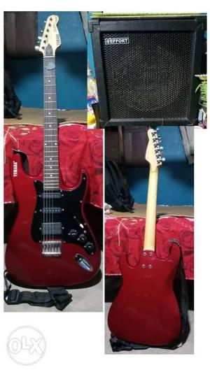 Red Stratocaster-style Electric Guitar And Guitar Amplifier
