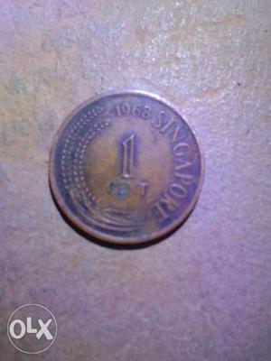 Round  Copper-colored 1 Singapore Coin