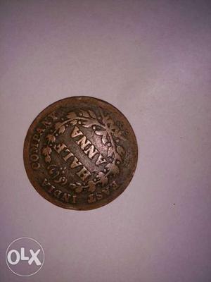 Round Copper-colored Half Indian Anna Coin