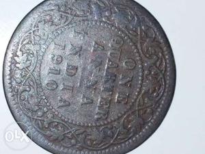 Silver-colored 1 Quarter India Anna Coin