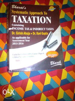 Taxation book of girish ahuja for A.Y. 