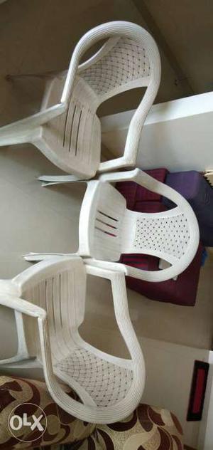 Three polyset chairs