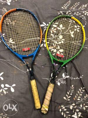 Two long tennis rackets for juniors