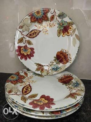 Unused heavy decorative dinner plates